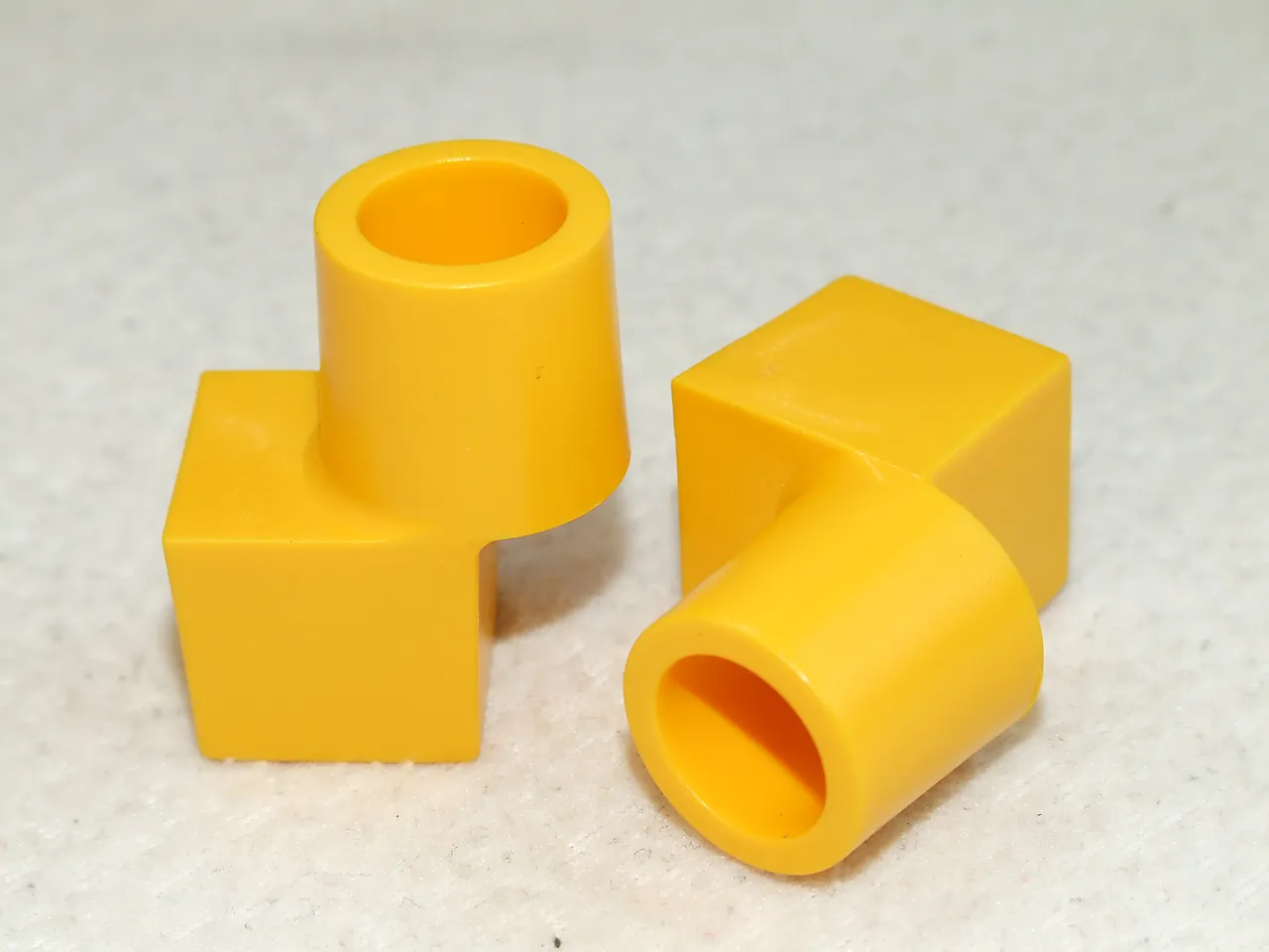 Låseknott gul 30stk/pose til kombimur og stor støttemur