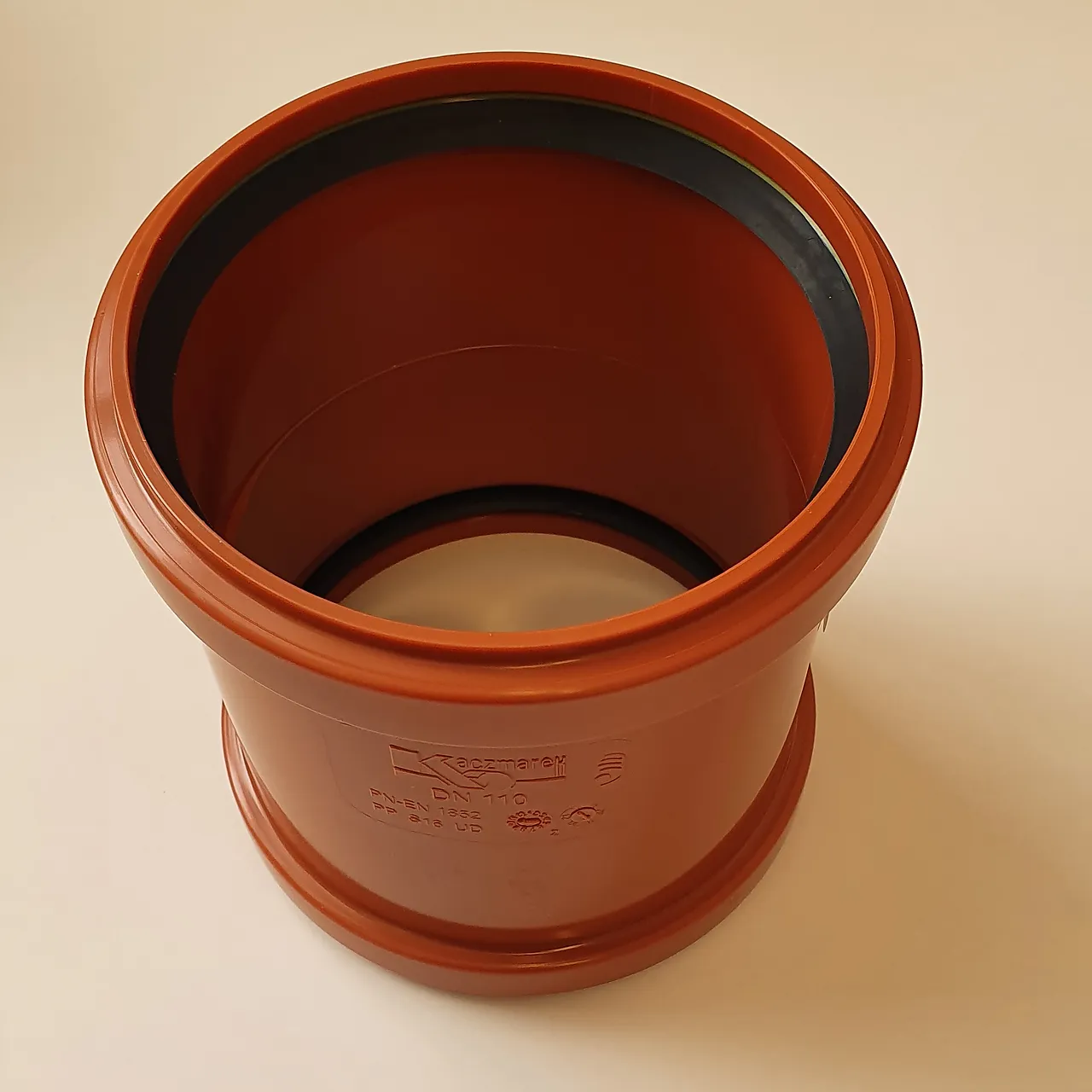 Glidemuffe 110 mm brun